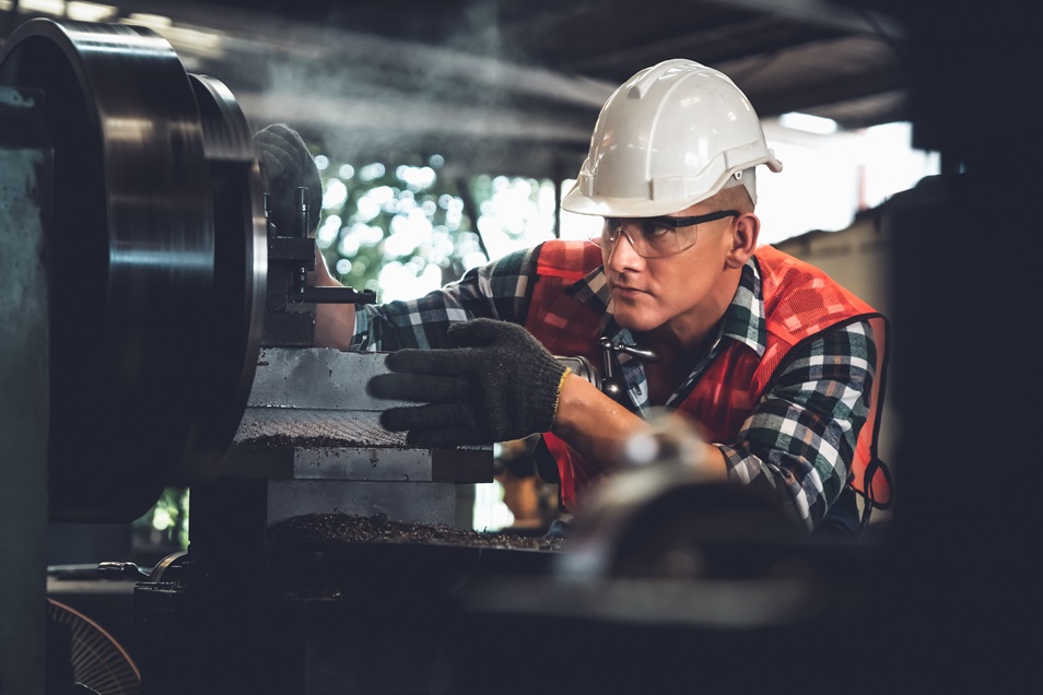 Smart Factory Worker Or Engineer Do Machine Job In A Manufacturing Workshop