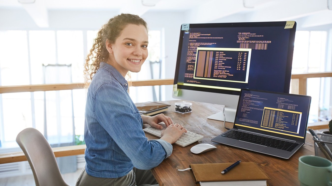 Lady working behind a PC